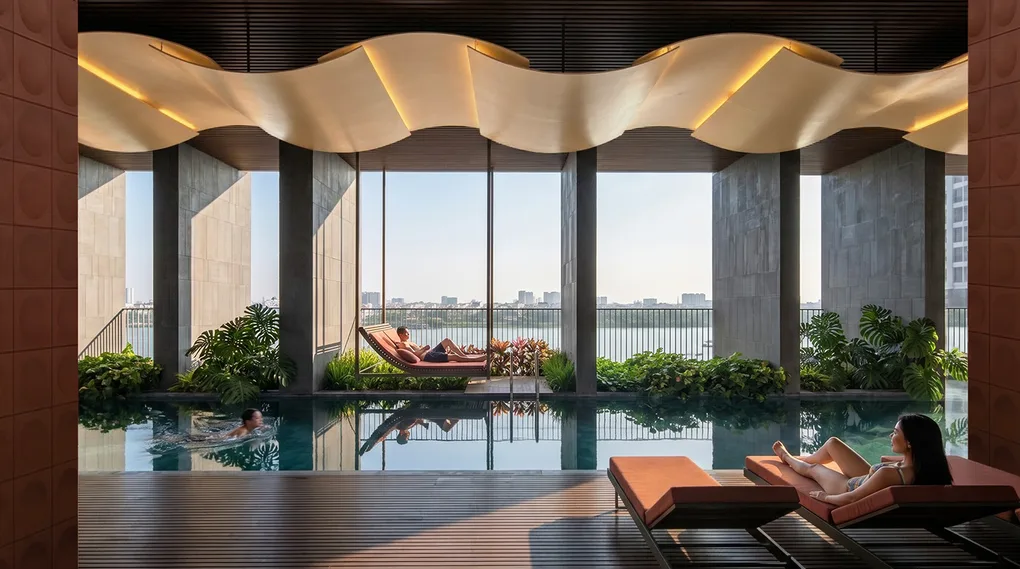 Hồ bơi và khu nghỉ ngơi hướng view sông trong thiết kế căn hộ Soma The First
